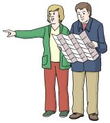 Frau und Mann gucken in eine Karte